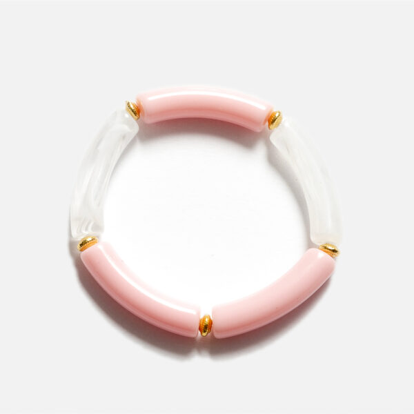 Bracelet jonc élastique composé de tubes en acrylique et de composants dorés à l'Or fin 24 carats. Il se porte seul ou à plusieurs, à marier à l'infini !