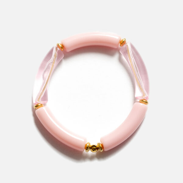 Bracelet jonc élastique composé de tubes en acrylique et de composants dorés à l'Or fin 24 carats. Il se porte seul ou à plusieurs, à marier à l'infini !